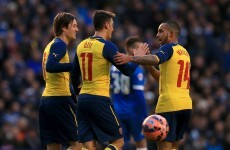 Walcott and Ozil on target as Cup holders Arsenal hold off Brighton