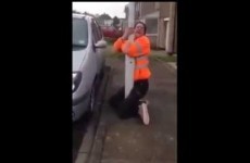 This guy's ingenious mates just tricked him into getting stuck on a lamppost