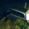 A 15 foot drop into a roadside fence ... but no-one was injured in this nasty-looking crash