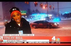 Driver recklessly drifts into news reporter's shot during New York blizzard