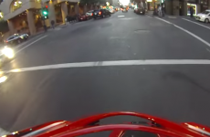 Motorcyclist gets hit by a car, miraculously lands on his feet