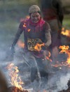 Would you run through fire and carry a cross? That's what it takes to finish the world's toughest race