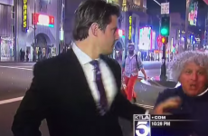Watch a news reporter mercilessly deal with a would-be videobomber