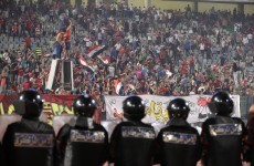 Egyptian police and football fans clash leaving dozens dead
