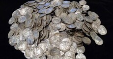 Man with metal detector finds one of Britain's largest hoard of buried treasure... hopes to buy new house