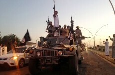Islamic State suicide bombers attack US forces after seizing town close to their base