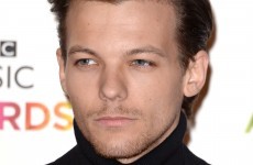 One Direction's Louis joked about being gay and fans FREAKED out
