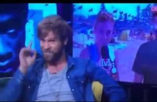 Watch as this TV host calls out a surfer live on air for texting his girlfriend