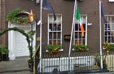 Man rushed to hospital after falling over railings outside Diceys Bar