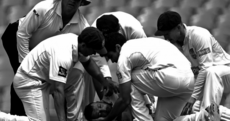 Heartbreaking: Image of injured Phillip Hughes wins prestigious prize