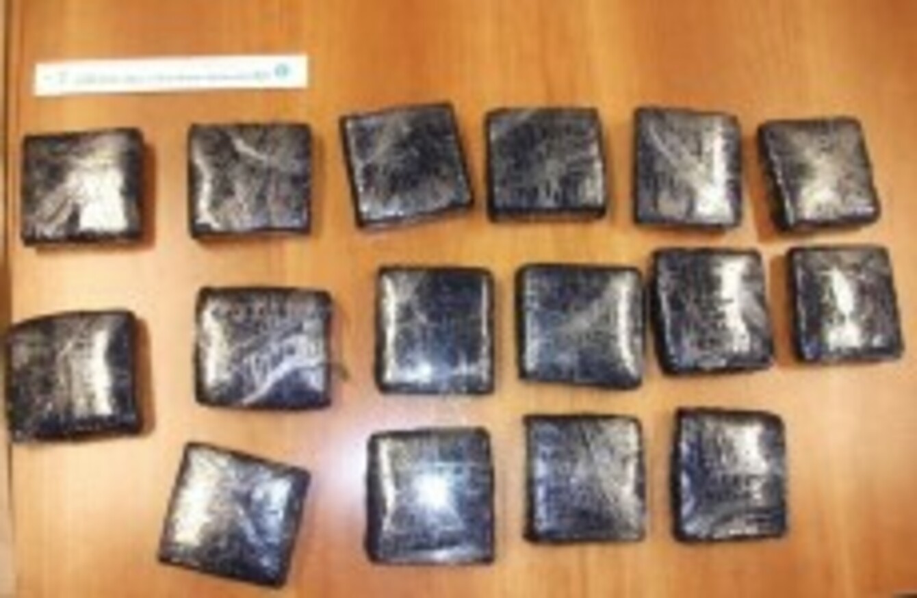 Two arrested after drugs hidden in lining of suitcase found in morning raid