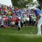 Watch Pádraig Harrington sink a clutch birdie putt on 18 like it's 2008 all over again