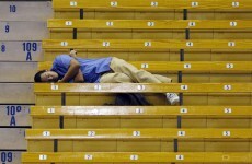 If you're going to fall asleep on the job, try not let it happen on a basketball court
