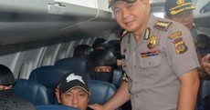 Australia complains after Indonesian police take pictures with men scheduled to die by firing squad