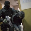 Pictures: Armed and masked police haul Nemtsov suspects before Moscow court