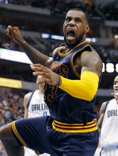 Some big dunks and a headband-less LeBron graced the NBA last night