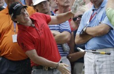 McIlroy battles on after injuring wrist at PGA