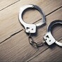 Policemen bring convicted murderer to brothel, get caught, allow murderer to escape