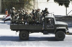 Syrian troops fire on fleeing residents in city of Latakia, say activists