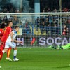 Montenegro fan turns himself in after allegedly striking player with flare