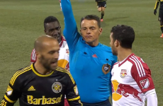 Has a referee ever looked more satisfied to be sending off a player?
