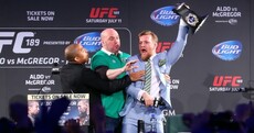 McGregor snatched Aldo's belt - and it very nearly kicked off in the Convention Centre
