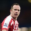 Where does Charlie Adam's goal rank in the pantheon of long-range Premier League strikes?
