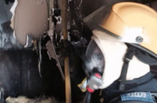Two people rescued after fire engulfs kitchen