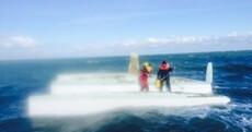 Pregnant woman airlifted to hospital after being spotted standing on upturned boat
