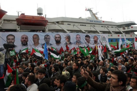 Pro-Palestinian activists cheer as the Mavi Marmara ship returns to Turkey last December. The boat was the scene of a bloody raid on 31 May, 2010, by Israeli marines who were ordered to stop the vessel from reaching Gaza. 