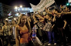 Thousands march in Madrid against Pope's visit