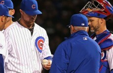The Chicago Cubs' $155 million ace has the yips and can't throw the ball to first base
