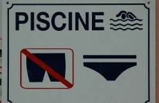 New Yorker suing over alleged swimming trunks dismissal