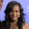 Confusion over whether Whitney Houston's daughter has awoken from two month coma