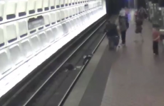 Man in wheelchair rescued after falling onto subway tracks