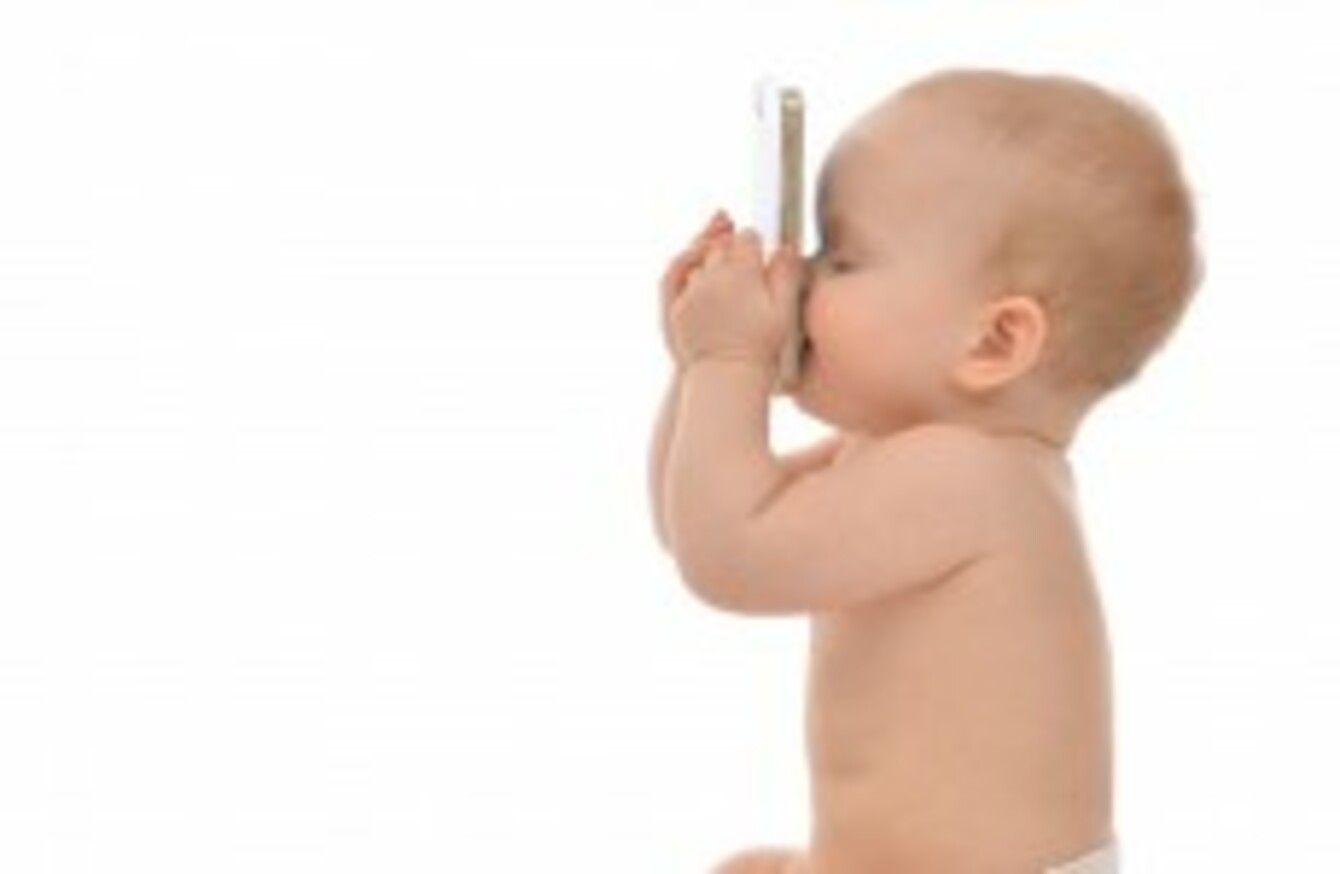 Babies are learning how to use phones before they can walk and talk