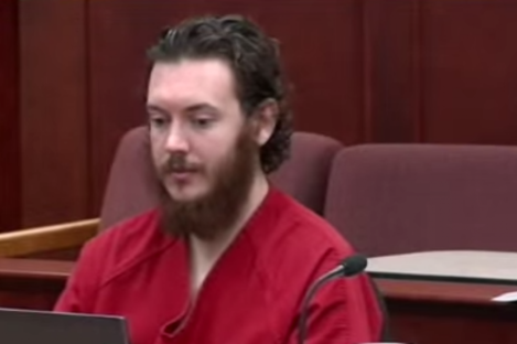 James Holmes sits at an earlier pre-trial hearing. 