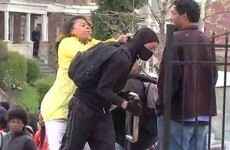 A Baltimore mother dragging her son out of riots has taken over the internet