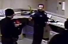 Police fist-bump in station after assault of arrested man