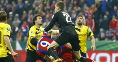 How was Robert Lewandowski allowed to stay on the pitch after this sickening clash?