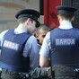 'We had to wrap stab vests around three kids to protect them from gunfire'