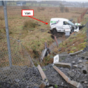 Crossing gates held open with a mobile phone charger led to a train hitting an An Post van