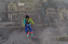Watch this group of mad yokes base jumping off one of the world's tallest buildings