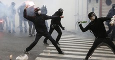 Police use tear gas on stone-throwing protesters