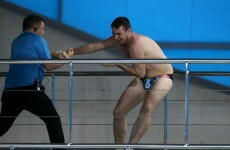 A fan broke through security to have a go at the world diving series & no it wasn't Ashley Young