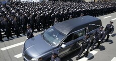Thousands bid farewell to NYPD officer who was shot in the head by an ex-convict