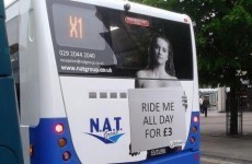 Bus company drops ad campaign that had topless woman with "Ride me all day" sign