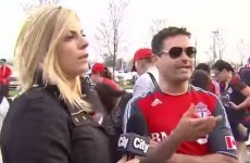 Reporter confronts football fans over shouts of "f*** her right in the p****"