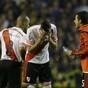 Boca Juniors thrown out of Copa Libertadores after fan attack on River Plate players