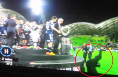 One of Australia's richest men fell head-first off the podium during a trophy presentation